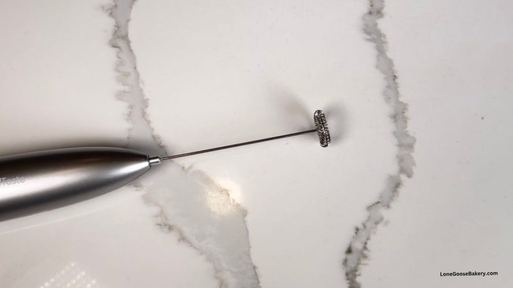 handheld frother in kitchen for brown sugar cold foam